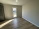 Laundry room with vinyl flooring and shelving at 158 Pate Landing Dr, Selma, NC 27576