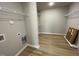 Spacious laundry room with built-in shelving at 158 Pate Landing Dr, Selma, NC 27576