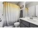 Bathroom featuring a shower with a curtain and a gray vanity at 1625 Banks View Dr, Raleigh, NC 27603
