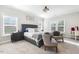 Bedroom featuring a large bed, neutral tones, and ample natural light, creating a serene and inviting atmosphere at 1625 Banks View Dr, Raleigh, NC 27603