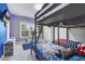 bedroom with bunk beds, blue accents and natural light at 1625 Banks View Dr, Raleigh, NC 27603