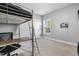 This bedroom features a bunk bed with a desk, providing a functional and cozy space at 1625 Banks View Dr, Raleigh, NC 27603