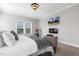 Bedroom featuring a large bed, neutral tones, and ample natural light, creating a serene and inviting atmosphere at 1625 Banks View Dr, Raleigh, NC 27603