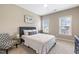 Inviting bedroom featuring a comfy bed, soft colors, and natural light creating a relaxing and peaceful atmosphere at 1625 Banks View Dr, Raleigh, NC 27603