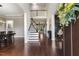 Grand foyer with gleaming hardwood floors, a staircase, and ample natural light creating an inviting entrance at 1625 Banks View Dr, Raleigh, NC 27603