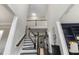 Spacious foyer featuring staircase with natural light and a view to an office room at 1625 Banks View Dr, Raleigh, NC 27603