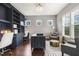 Stylish home office with custom built-ins, designer lighting, and comfortable seating for a productive workspace at 1625 Banks View Dr, Raleigh, NC 27603
