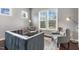 Comfortable sitting room featuring neutral colors and plenty of natural light from the large windows at 1625 Banks View Dr, Raleigh, NC 27603