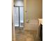 Bathroom with a shower and bathtub at 2001 Bunnfield Dr, Zebulon, NC 27597