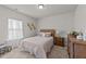 Bright bedroom featuring a comfortable bed, neutral carpet and natural light at 2001 Bunnfield Dr, Zebulon, NC 27597