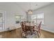 Bright breakfast nook featuring a round table with seating and views of the backyard at 2001 Bunnfield Dr, Zebulon, NC 27597