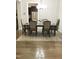 Formal dining room featuring hardwood floors and chandelier at 2001 Bunnfield Dr, Zebulon, NC 27597