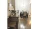 Formal dining room with hardwood floors and chandelier at 2001 Bunnfield Dr, Zebulon, NC 27597
