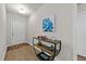 Bright foyer showcasing hardwood floors, stylish console table, and a welcoming ambiance at 2001 Bunnfield Dr, Zebulon, NC 27597