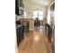 Kitchen with dark cabinetry, granite counters, and stainless steel appliances at 2001 Bunnfield Dr, Zebulon, NC 27597