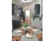 Open kitchen with breakfast bar and dark wood cabinets at 2001 Bunnfield Dr, Zebulon, NC 27597