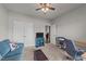 Comfortable living room with a modern desk, couch and large storage cabinet at 2001 Bunnfield Dr, Zebulon, NC 27597