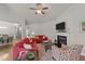 Bright living room with fireplace, comfortable seating, and open layout creates a cozy atmosphere at 2001 Bunnfield Dr, Zebulon, NC 27597