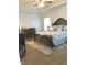 Large main bedroom with hardwood floors and a dresser at 2001 Bunnfield Dr, Zebulon, NC 27597