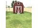 Red storage shed in backyard at 2001 Bunnfield Dr, Zebulon, NC 27597