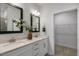 Double vanity bathroom with large mirror and walk in closet at 2334 Sugar Cone Way, Fuquay Varina, NC 27526