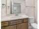 Bathroom with single vanity and toilet at 317 Umstead St, Sanford, NC 27330