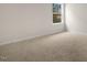 Bright bedroom with window and carpet at 317 Umstead St, Sanford, NC 27330