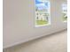 Spacious bedroom with neutral carpeting and large windows at 317 Umstead St, Sanford, NC 27330