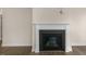 Modern gas fireplace with a sleek dark stone surround at 317 Umstead St, Sanford, NC 27330