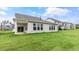 Back exterior of house with grassy yard at 317 Umstead St, Sanford, NC 27330