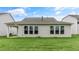 Back exterior view showing a spacious yard at 317 Umstead St, Sanford, NC 27330