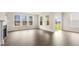 Spacious living area with sliding glass doors opening to a patio and large windows at 317 Umstead St, Sanford, NC 27330