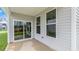 Covered patio with sliding glass doors at 317 Umstead St, Sanford, NC 27330