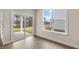Sunroom with sliding glass doors and windows offering backyard views at 317 Umstead St, Sanford, NC 27330