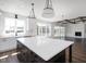 Bright and airy kitchen with a large island and views to the backyard at 321 Bud Wall Rd, Youngsville, NC 27596