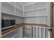Walk-in pantry with ample shelving and a wood countertop at 321 Bud Wall Rd, Youngsville, NC 27596