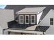 Home exterior featuring a dormer and combination metal and shingle roof at 321 Bud Wall Rd, Youngsville, NC 27596