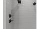 Bright, tiled shower featuring dual shower heads and sleek fixtures at 321 Bud Wall Rd, Youngsville, NC 27596