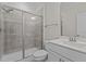 Modern bathroom with a walk-in shower and white vanity at 355 High Woods Rdg, Chapel Hill, NC 27517