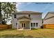 Spacious backyard with a covered patio, offering an ideal space for outdoor gatherings and relaxation at 364 Pecan Valley Way, Four Oaks, NC 27524