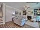 Comfortable living room with fireplace, built-in shelving, and neutral tones with great natural light at 364 Pecan Valley Way, Four Oaks, NC 27524