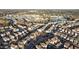 Aerial view of houses, streets, a lake, and park at 413 Holding Creek Dr, Wake Forest, NC 27587