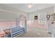 Cozy bedroom with pink walls and a canopy bed at 413 Holding Creek Dr, Wake Forest, NC 27587