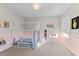 Charming bedroom with pink walls and a house-shaped bed at 413 Holding Creek Dr, Wake Forest, NC 27587