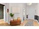 Entryway with light walls, a mid century modern console table and a patterned rug at 413 Holding Creek Dr, Wake Forest, NC 27587