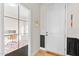 Bright entryway with a white door, a glimpse of an office, and dark wainscoting at 413 Holding Creek Dr, Wake Forest, NC 27587