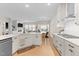 Modern kitchen with white cabinets and gas range at 413 Holding Creek Dr, Wake Forest, NC 27587