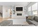 Spacious living room with fireplace and built-in shelving at 413 Holding Creek Dr, Wake Forest, NC 27587