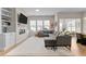 Open living space with sectional sofa and fireplace at 413 Holding Creek Dr, Wake Forest, NC 27587