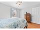 Bedroom with a wooden dresser and hardwood floors at 521 N Franklin Dr, Sanford, NC 27330